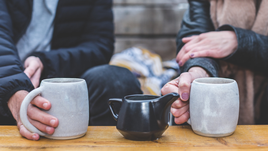two people enjoying coffee